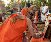 H.H. Swamiji with Swami Narayangiriji paying obeisance to Ishwaranand GiriJi Maharaj